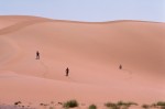 Children playing on dunes at Haylat il Harashiif