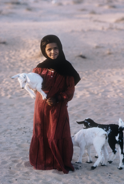 Girl with goats