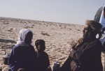 Man and children at camp in Sahma