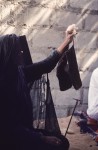 Wahiba woman carding wool