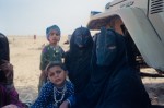 Woman and children awaiting immunization